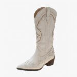 Botte cowboy femme blanche avec motifs authentiques sur fond blanc