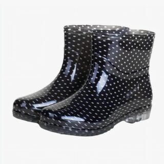 Botte de pluie femme noire avec motifs à pois sur fond blanc